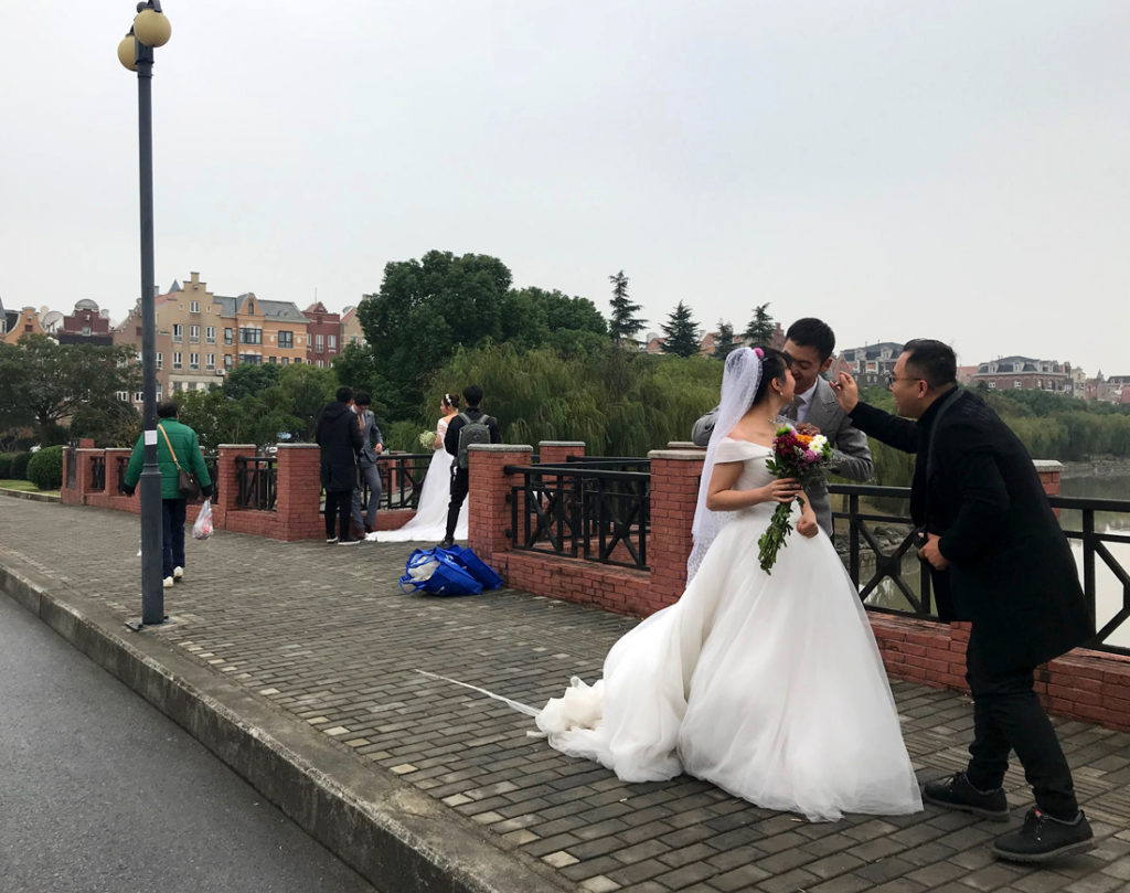 Brides couples on bridge