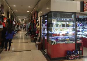 Several long halls filled with stalls Inside Han City Plaza