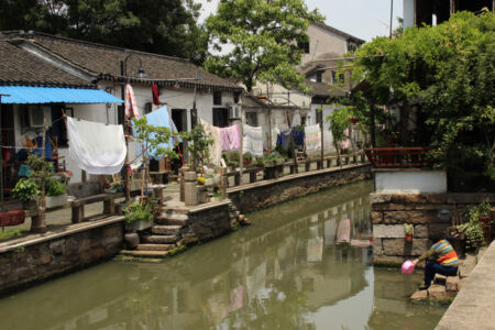 Canal along Pingjiang Rd. is a place where people live and work Canal scene on Pingjiang Rd