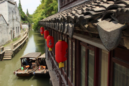 Pretty lanterns and boats in the canal along Pingjiang Road Canal photo