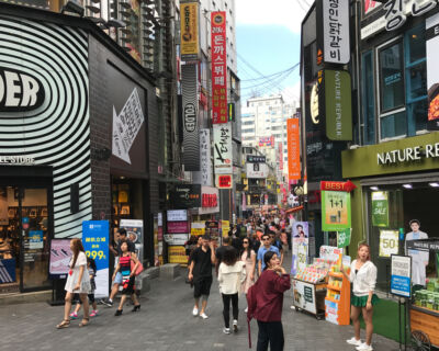 Typical street scene in shopping area around hotel. Myeong-dong District