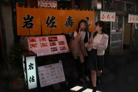 Girls outside restaurant