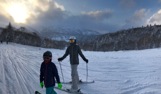 Two skiers having a beautiful day. skiers at Kiroro