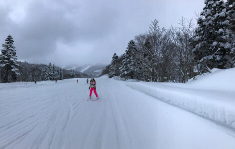 Bright colors sure stand out against the snowy backdrop. Random skier