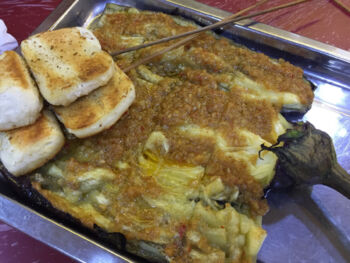 Yummy! Grilled eggplant and garlic served with grilled buns Grilled eggpland and bread bun