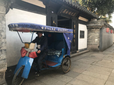My tour guide took me around the old town. He only speak Chinese so I had to really try and understand. Tour guide and his three-wheeler