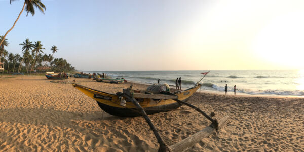 Fishermen use these boat to haul a net out into the ocean. It's cool to watch how it's done. Pontoon boats on the beach