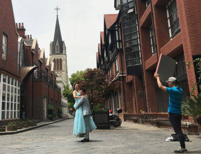 Groom lifting his bride