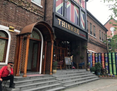 Haha, caught this guard thinking deeply about something. Probably wondering what those big books are all about. Thinker Cafe and Bar