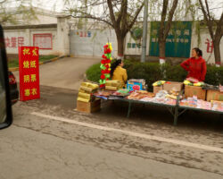 Roadside popup stand selling burnable money
