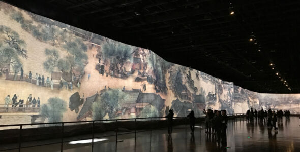 The display changes several times to show different aspects of the scene Video display of painting