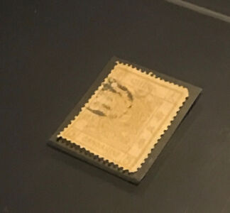 A close up of the stamp. It's looks better in person although is quite faded now. Closeup of first stamp of China