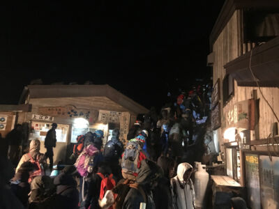 2:30 am and crowds form on the trail up to the summit. crowded trial from 8th station