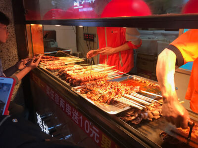 Chicken, beef, squid, and other meat on a stick. Meat on a stick