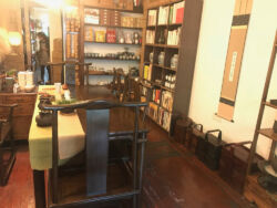 There is table for larger groups to sit and have tea Back room at tea shop