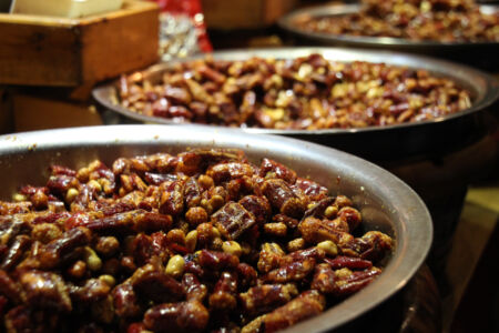These are my favorite snacks. Dry fried, red peppers stuffed with crispy sesame. My favorite snack