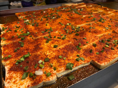 These are sort of thick tofu with generous dusting of hot and numbing spice. Spicy Tofu cakes