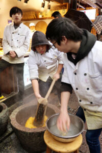 Making those chewing gourd snacks hammering the gluten