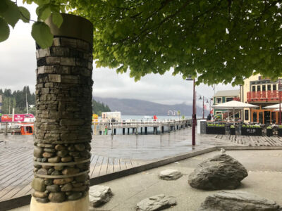 This monument is for the two major floods that occurred in Queenstown. The bands near bottom show the water levels. Flood marker