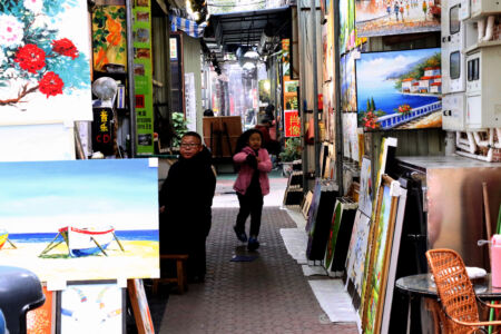 Ally with painter and art on display