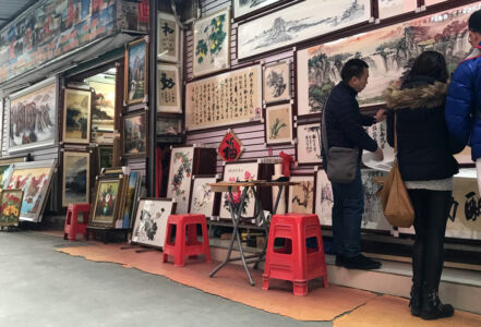 Art lovers doing some shopping People looking and commissioning artwork