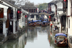 cluster of boats in canal