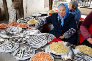 All these old ladies were together selling dry fishes Dry fish